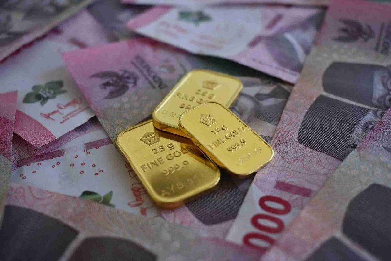 Harga Emas Dunia Menguat Tipis, Arah Kebijakan The Fed Masih Jadi Penentu